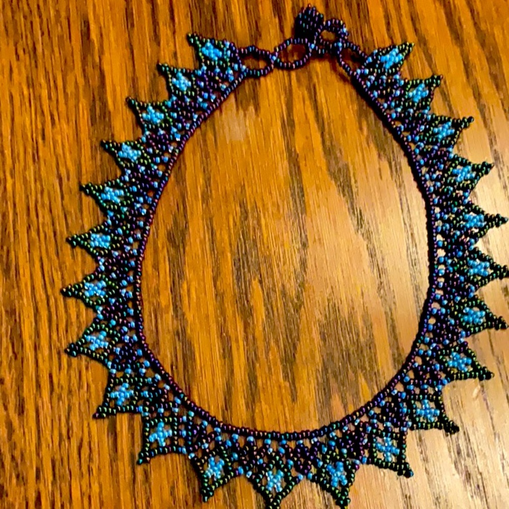 Multi colored 14 inch beaded choker necklace. Brand new and never worn!!